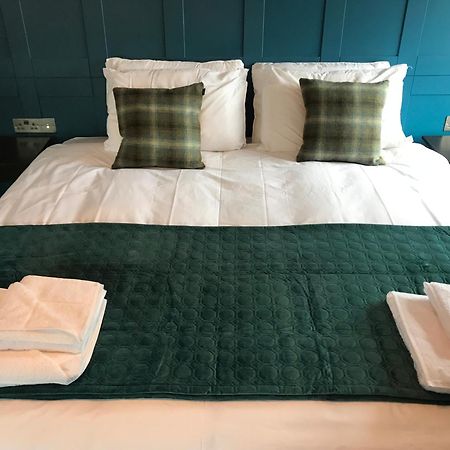 No.16 Hotel Seaham Room photo A bed with a bed runner