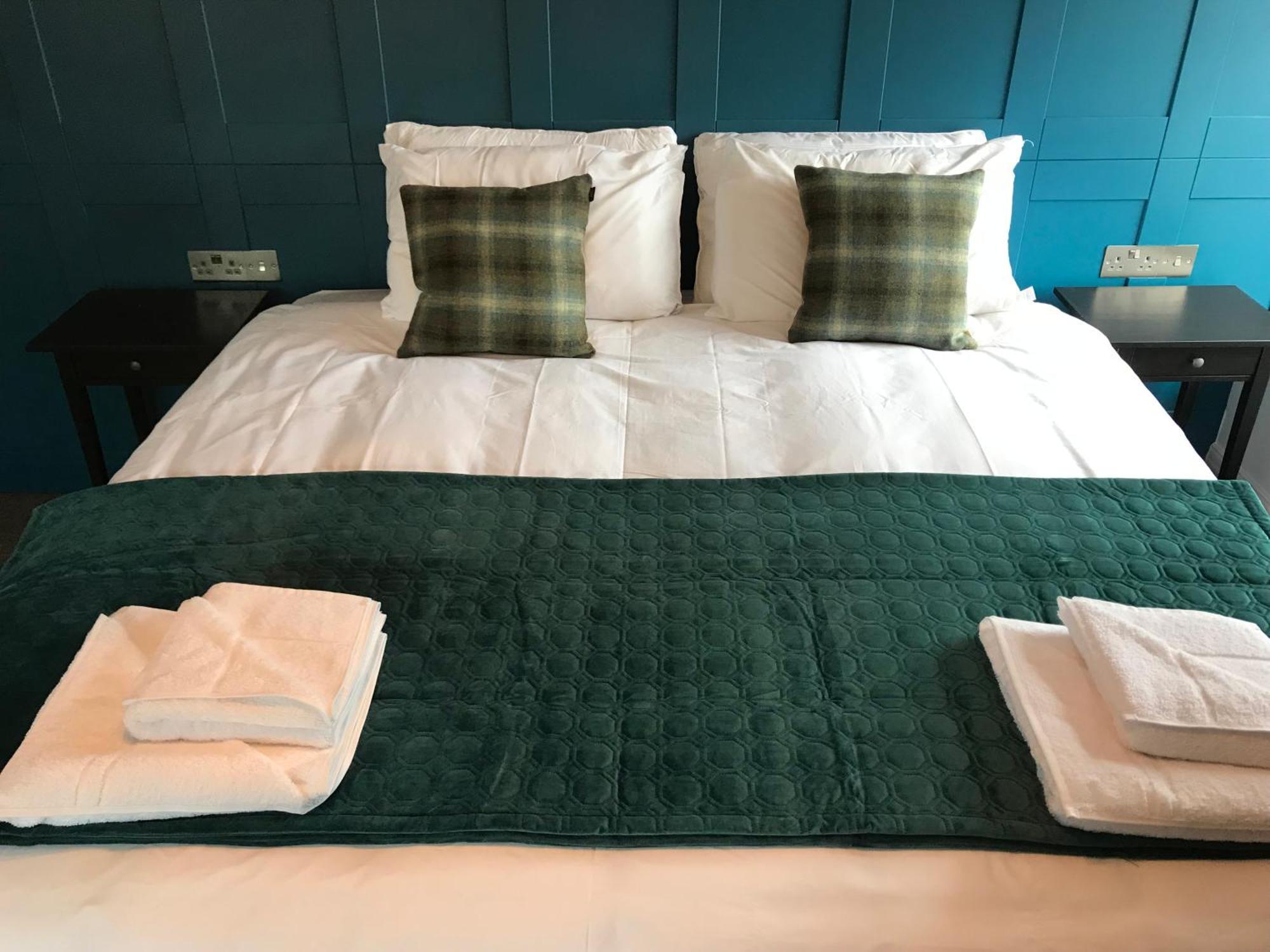 No.16 Hotel Seaham Room photo A bed with a bed runner